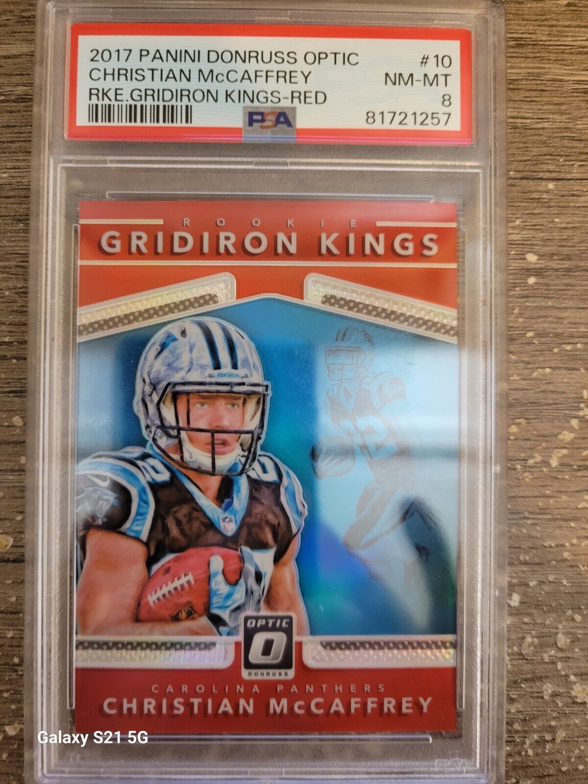 2017 Donruss Optic Rookie Gridiron Kings Red #10 Christian McCaffrey 56/99 PSA 8